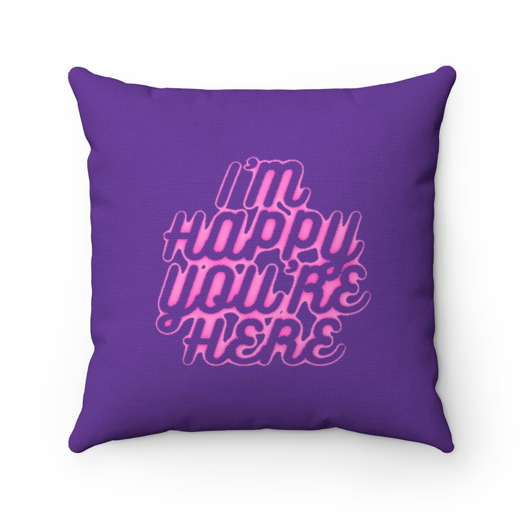 a purple pillow sitting on top of a purple pillow