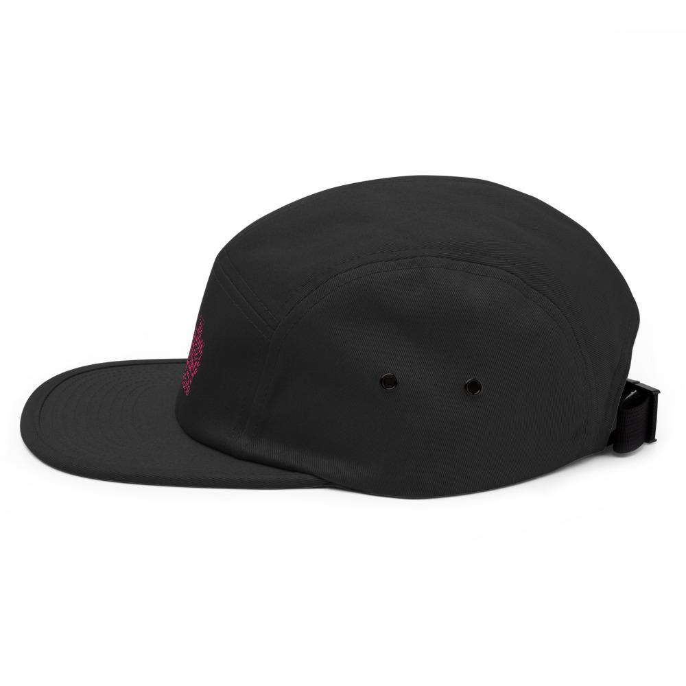 a black hat on top of a surfboard 